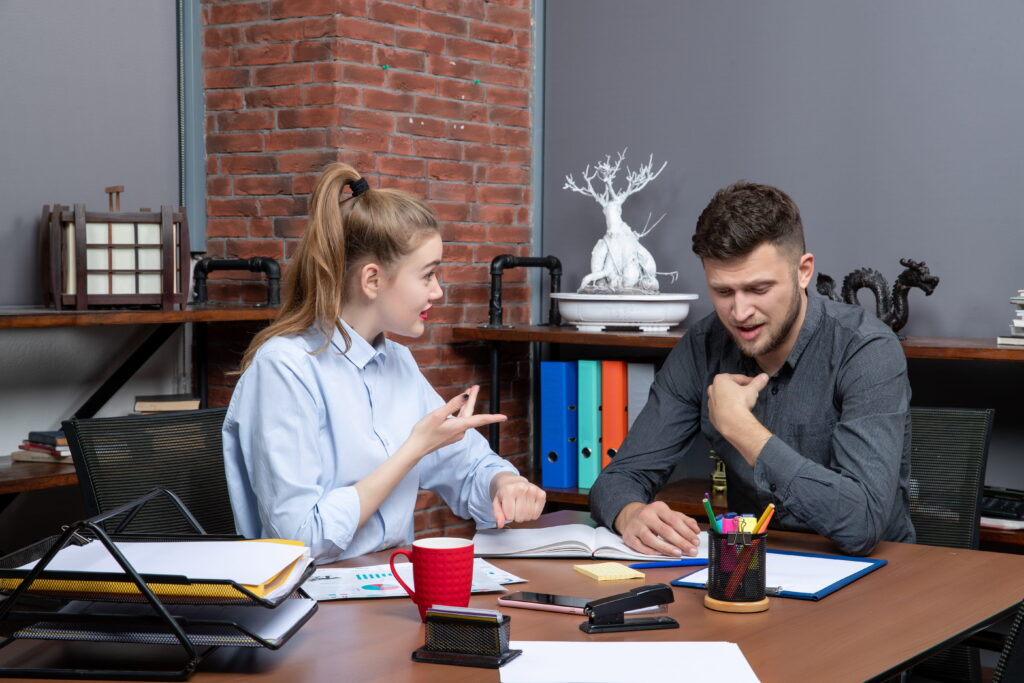 two business people talking about business english important