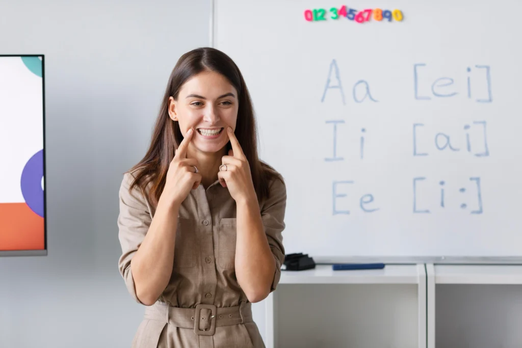 young woman doing speech therapy kids 1