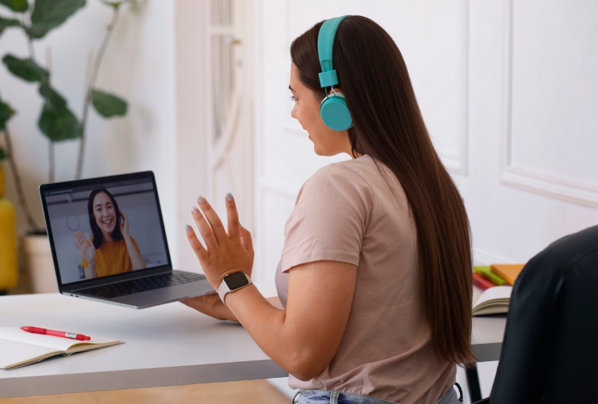 a women attending speaking fever online class