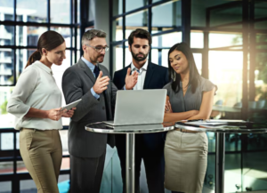 a group of people talking about business