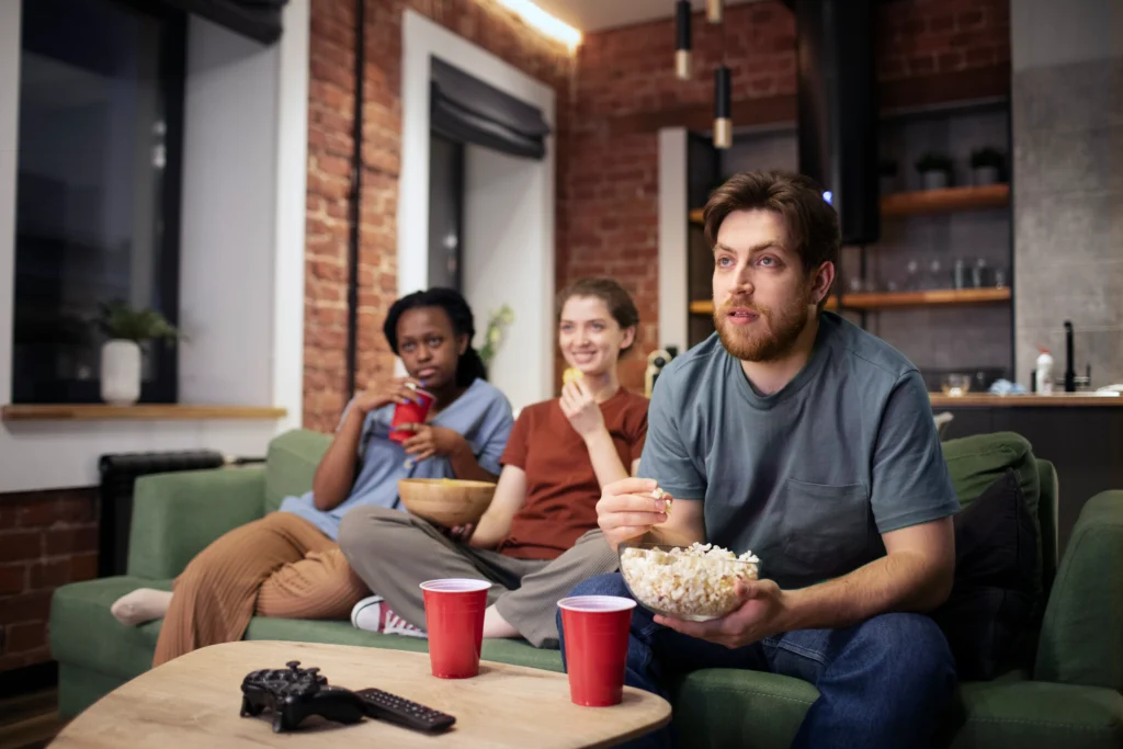 group of friends watching movie in english