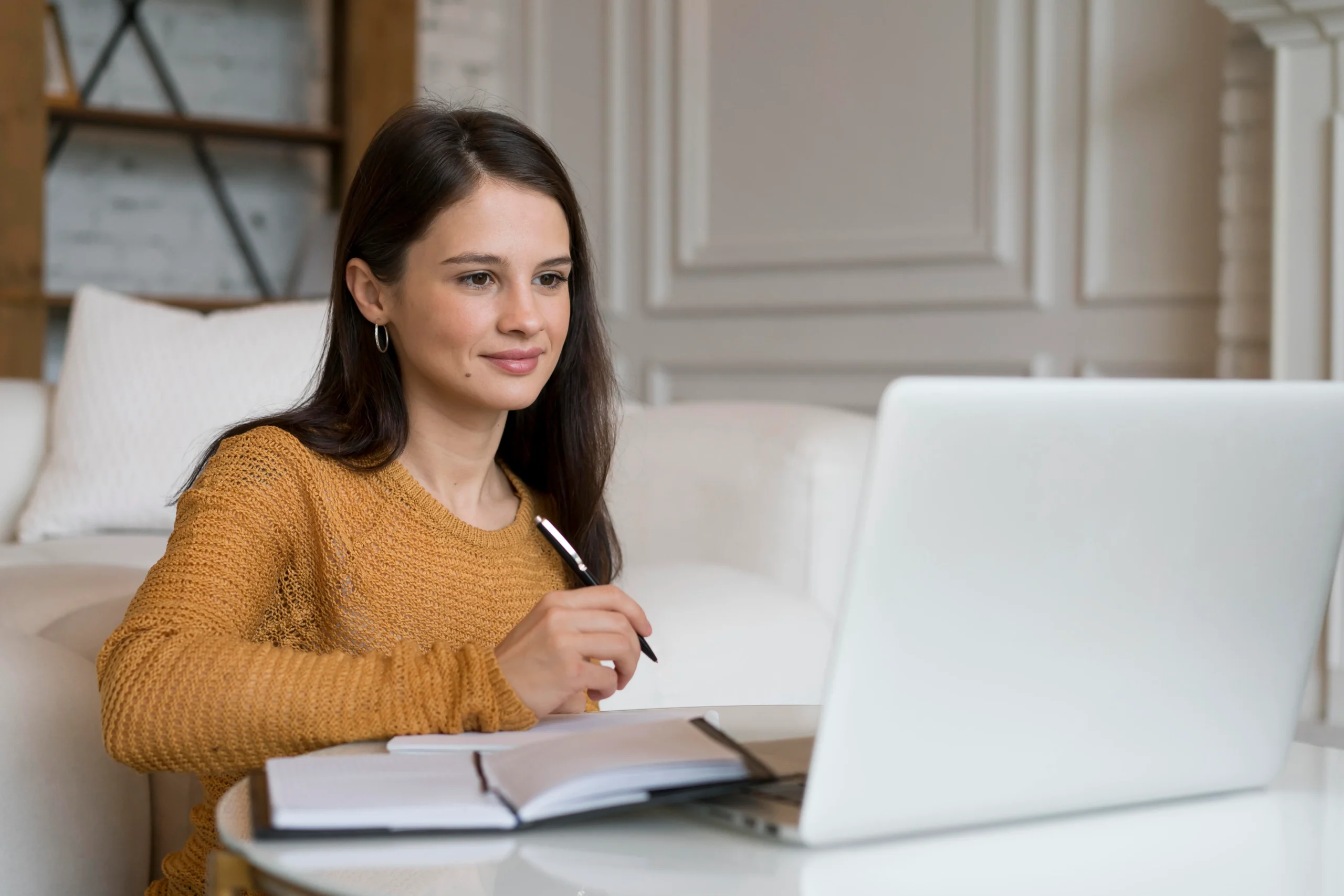 young woman working her laptop 1 scaled